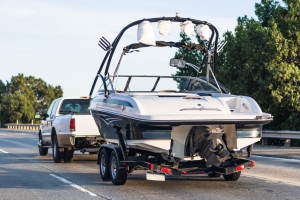 Truck towing a boat on the interstate, California