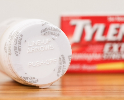 Safety Seal and Opening Instructions on Tylenol Bottle