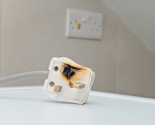 Burned ac Power Plugs and Sockets