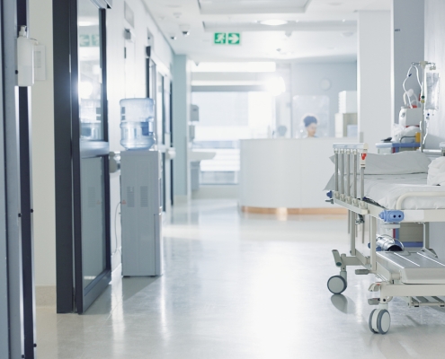 Hospital, healthcare and medical with an empty corridor for wellness, care or treatment and disease control. Medicine, service and hallway of a lobby in a clinic for rehabilitation or recovery