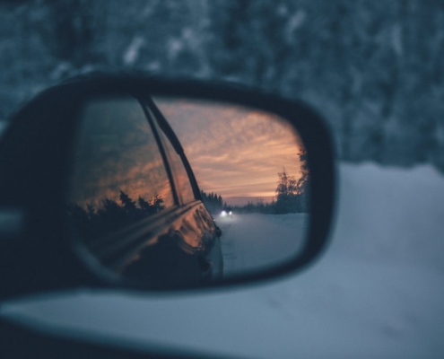 looking through a car's rearview mirror
