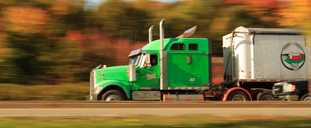 truck driving down the road