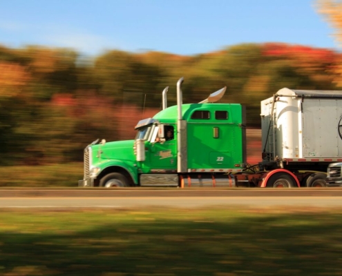 truck driving down the road