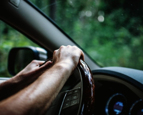 hands on a steering wheel