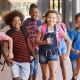 group of school kids running