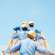 workers climbing a ladder