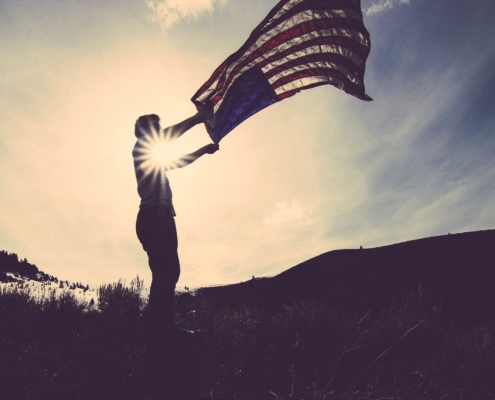 american flag in the sunset