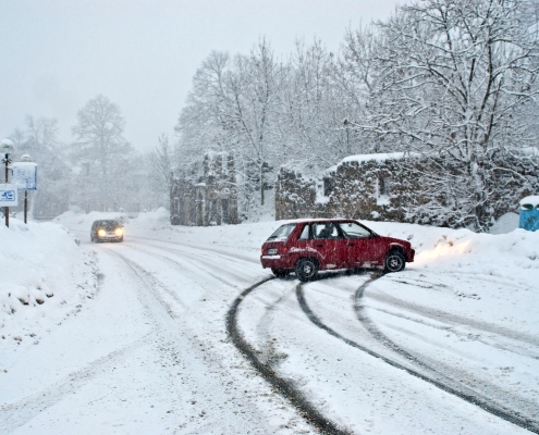 car slide out of snow road