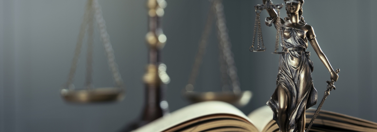 Legal and law concept statue of Lady Justice on the table with book and scale