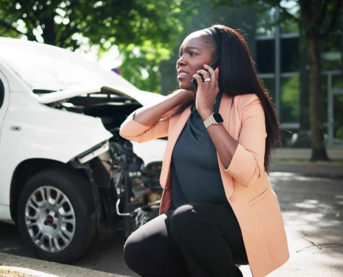 Woman Talking To Reliable Car Mechanic. Breakdown And Crash