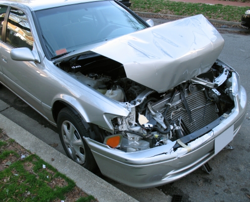 Photo of car with a lot of damage-probably at least $6000.