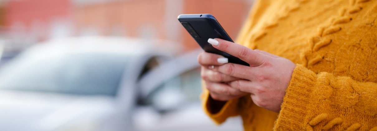 young woman Hispanic crashed with his car using his cell phone. road safety concept