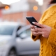 young woman Hispanic crashed with his car using his cell phone. road safety concept