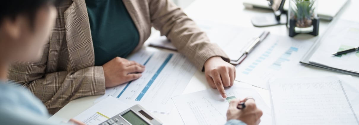 business man Auditor or internal revenue service staff checking annual financial statements company Audit Â Accounting tax