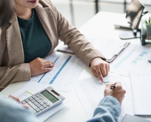 business man Auditor or internal revenue service staff checking annual financial statements company Audit Â Accounting tax