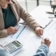 business man Auditor or internal revenue service staff checking annual financial statements company Audit Â Accounting tax